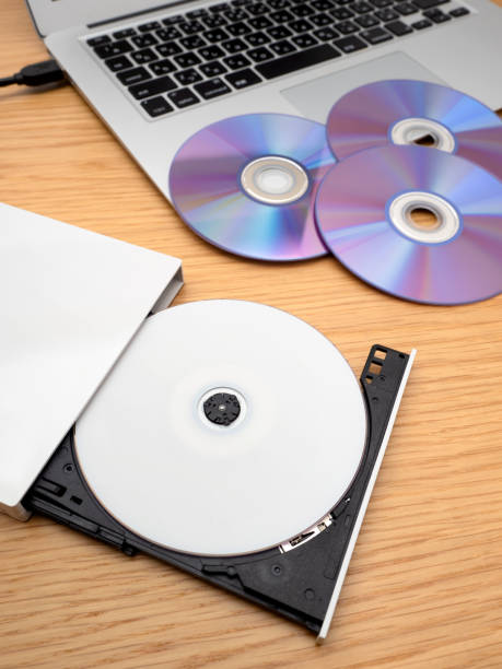 istock DVD drive connected to a laptop 1338031024