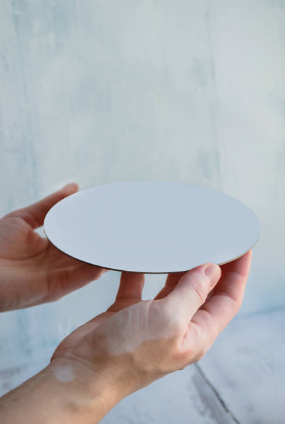 istock template for advertising your products with empty white tray in womans hands 1338032388