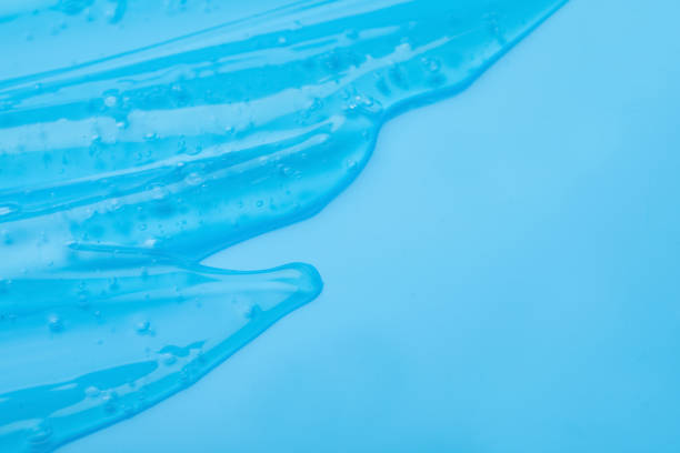 istock Pure transparent cosmetic gel on light blue background, closeup 1338045198