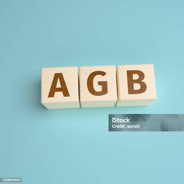 Agb The German Abbreviation For Allgemeine Geschäftsbedingungen Built From Letters On Wooden Cubes High Angle View With Copy Space Stock Photo - Download Image Now