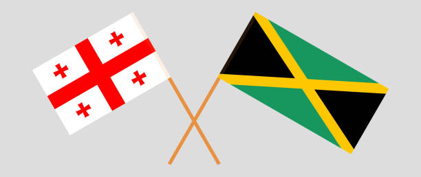Crossed flags of Georgia and Jamaica. Official colors. Correct proportion Crossed flags of Georgia and Jamaica. Official colors. Correct proportion. Vector illustration georgia football stock illustrations