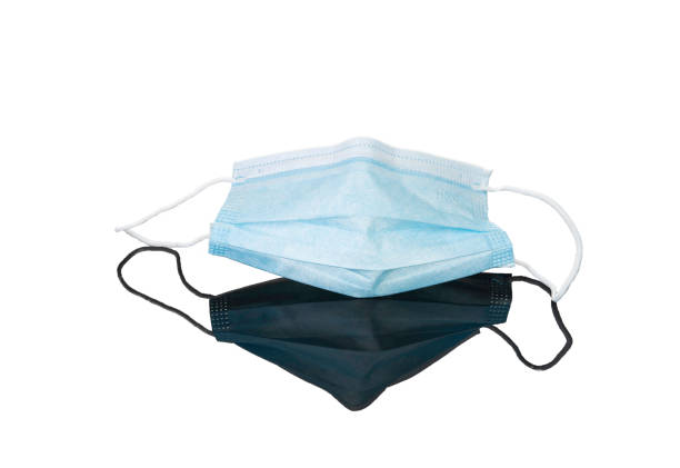 istock Blue medical face masks isolated on white 1338050466