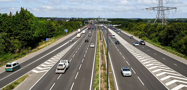 Kempten, Allgäu, Schwaben, Bavaria, Germany, may 1st 2022, daytime traffic on the German A7 Autobahn at the Allgäu interchange (half cloverstack type) near Kempten - with a length of 963 km between the borders of Denmark in the north and Austria in the south, the  Autobahn 7 is the longest Autobahn in Germany