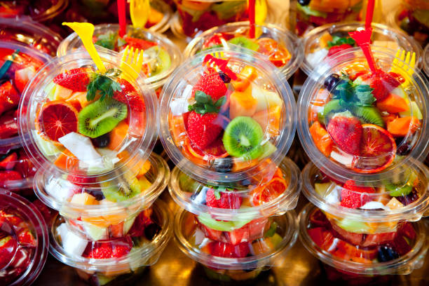 istock Colorful fruit salad in transparent glasses 1338058219