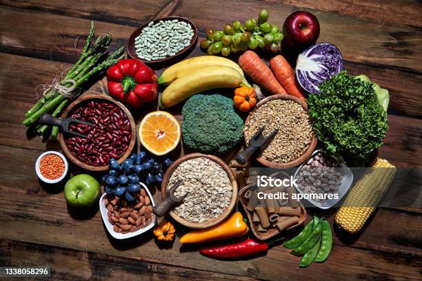 Top View Of Dietary Fiber Fresh Vegan Food And Legumes On Rustic Wooden Table Healthy Food Themes With Frame And Copy Space Stock Photo - Download Image Now