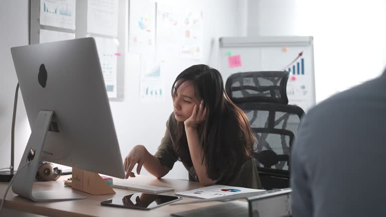 Businesswoman bored at work in office