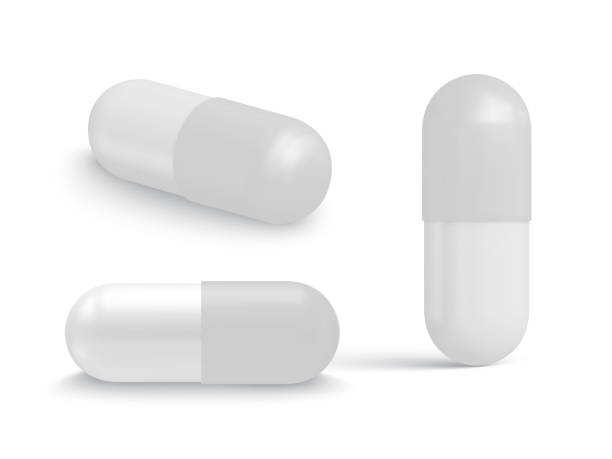 istock Collection of oval, round and capsule shaped tablets isolated on white background. Medicine and drugs. Vector illustration 1338065147