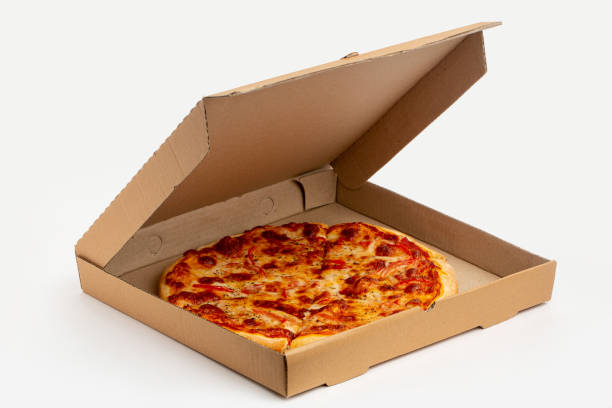 istock Delivery service, pizza in paper box dilevered to home 1338065270