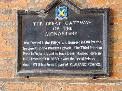 Sign for the Great Gateway near St Albans Cathedral, St Albans, Hertfordshire, England, UK. This is beside St Albans Cathedral.