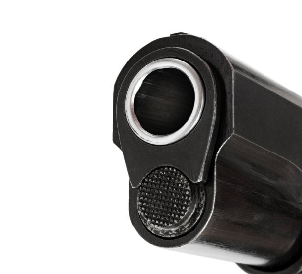 istock Muzzle of a semi-auto pistol quartering toward the viewer 1338071322