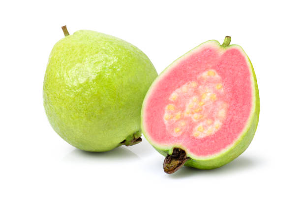 istock Fresh guava fruit and pink guava cut in half slice isolated on white background. 1338075423