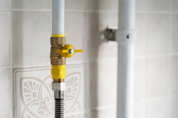 Gas valve on the gas pipe on the kitchen stock photo