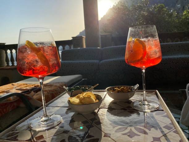 istock Campari Spritz and Bar snacks on mediterrainian style ceramic table. Positano, Italy 1338076941