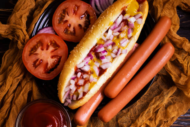 istock hot dog on a wooden background 1338080088