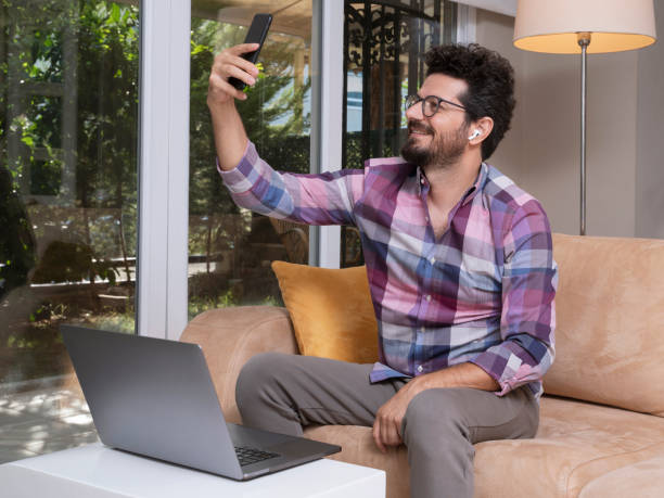 istock Freelance businessman working on his laptop at home 1338080942