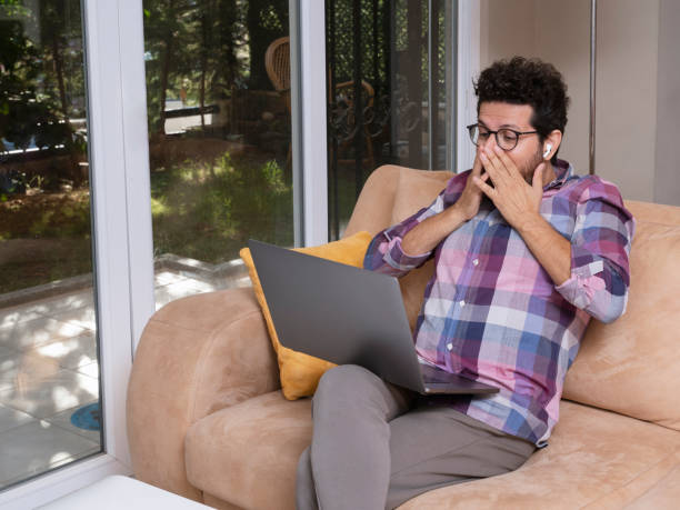 istock Freelance businessman working on his laptop at home 1338081128
