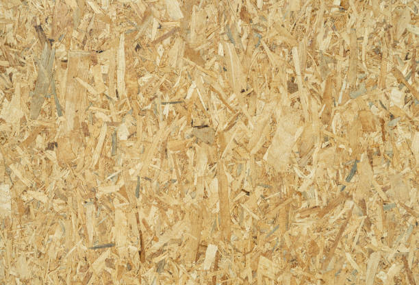 istock Wood particleboard or oriented strand broad textured background recycled for home decoration 1338085195