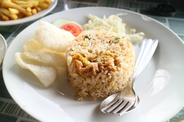 istock delicious fried rice on a white plate photo 1338085419