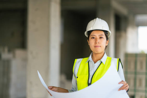 istock Portrait of young female engineer on construction site 1338087582