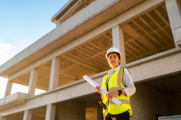 istock Portrait of young female engineer on construction site 1338088650