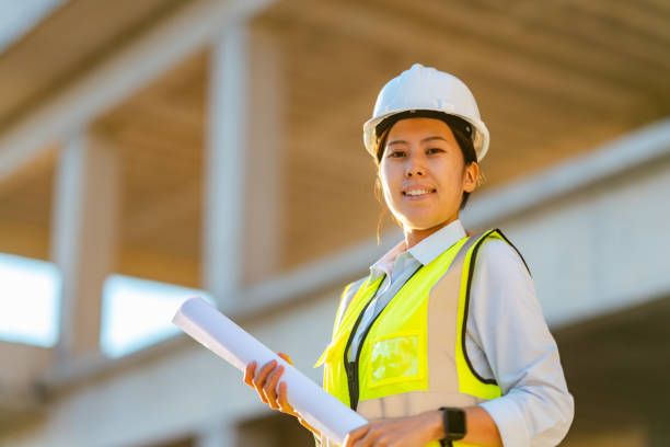 istock Portrait of young female engineer on construction site 1338091168
