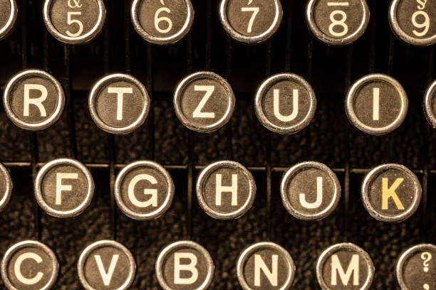 máquina de escribir antigua - typebar fotografías e imágenes de stock
