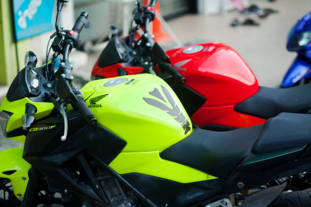 Refueling the motorcycle at the gas station