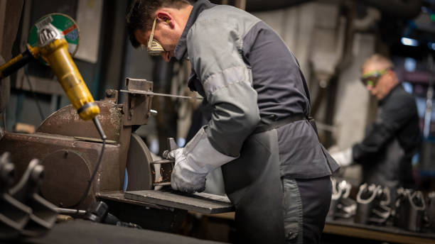 istock Side view of mature man working in factory 1338102773