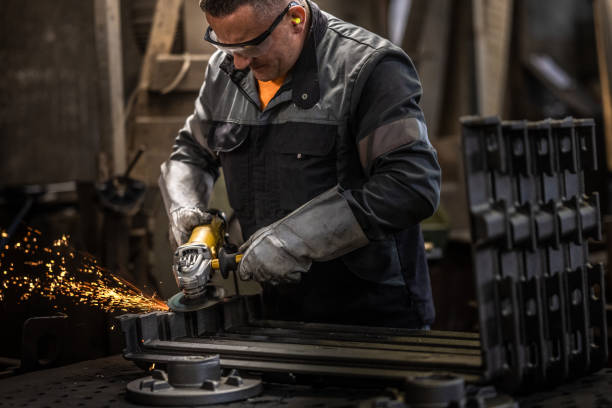 istock Mature man grinding metal equipment 1338102787