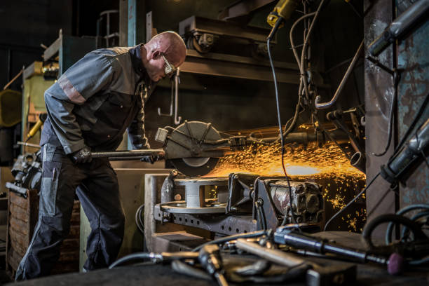 istock Side view of mature man shaping metal 1338102828
