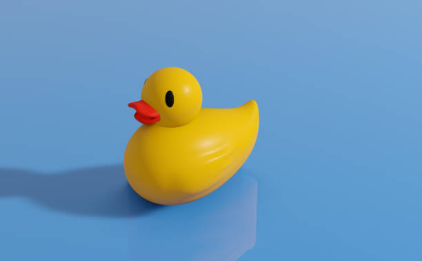 istock A rubber yellow duck on a blue background 1338111020