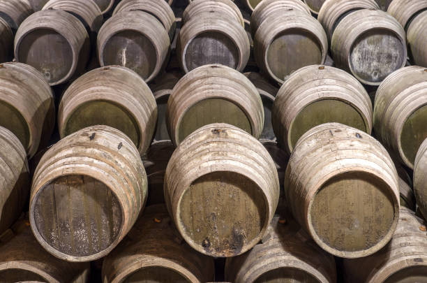 istock several barrels for whiskey or wine in stock 1338111664