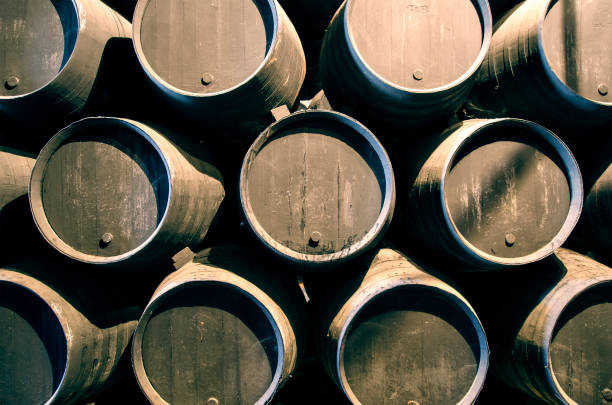 istock Wine or whiskey barrels stacked in Winery 1338112218