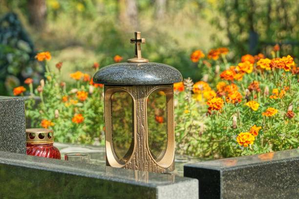 istock one big lamp with a cross stands on a black marble 1338113758