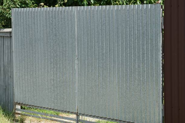 istock one large gray closed metal gate 1338114975