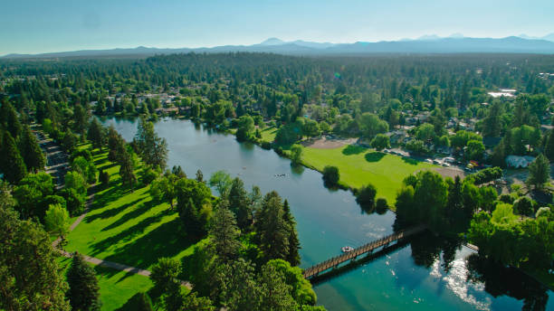 istock Deschutes River Winding Past Parks in Bend, OR - Aerial 1338118703
