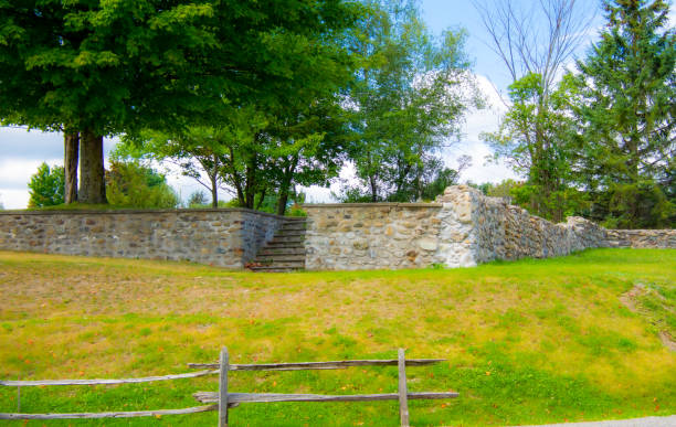 istock Nice little stone wall near a field 1338127823