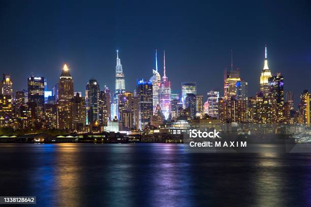 Night New York Reflective City Lights Stock Photo - Download Image Now - New York City, Urban Skyline, Night