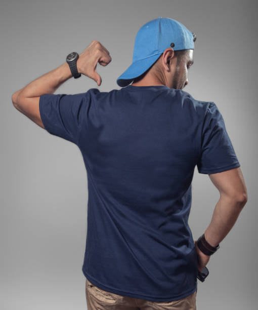 back view mockup of male hispanic model wearing navy blue t-shirt - fashion men fashion model male imagens e fotografias de stock