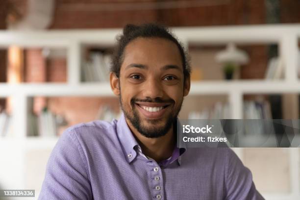 Headshot Portrait African 30s Man Smile Look At Camera Stock Photo - Download Image Now