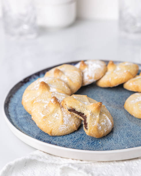 istock Chocolate filled shortbread cookies in a white kitchen 1338135258