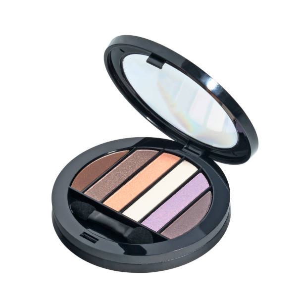 istock Open cosmetic set with eye shadows and applicators in black plastic case isolated 1338138264