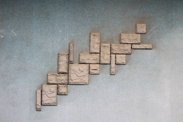 Abstract pattern on the wall of tiles imitating wild stone. Background