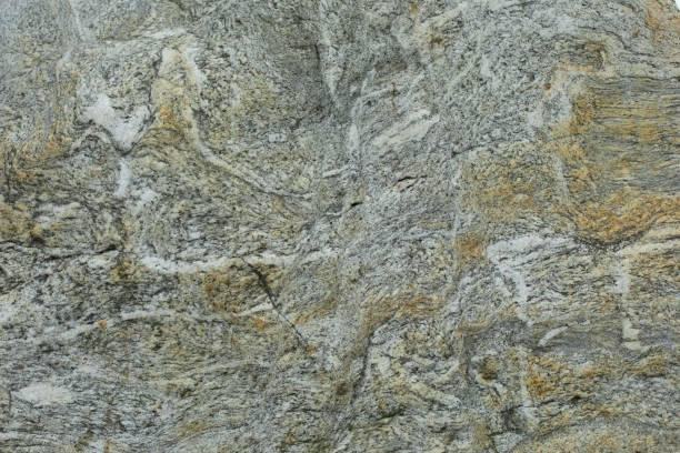 istock The texture of the rock. The background is a stone surface. 1338150168