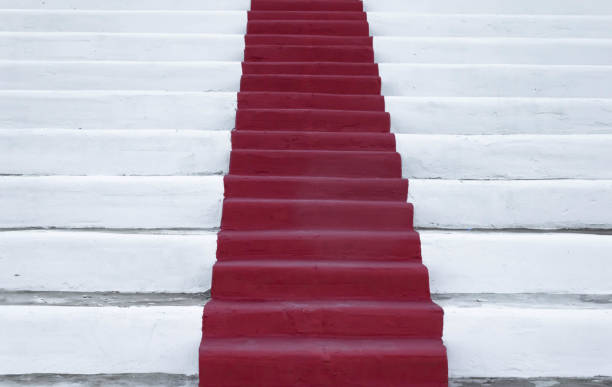 istock White stone stairs with a red stripe in the middle 1338158639