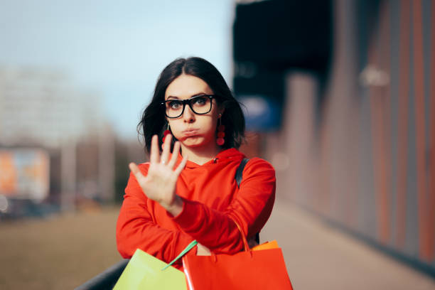 istock Shopping Woman Making Stop Hand Gesture 1338173201