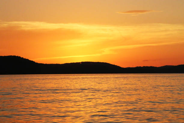 a golden sunset at the lake
