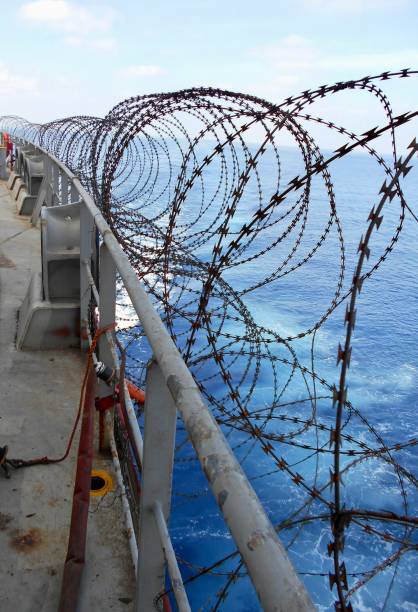 istock Vessel hardening is done with razor wire and wire fencing 1338180838