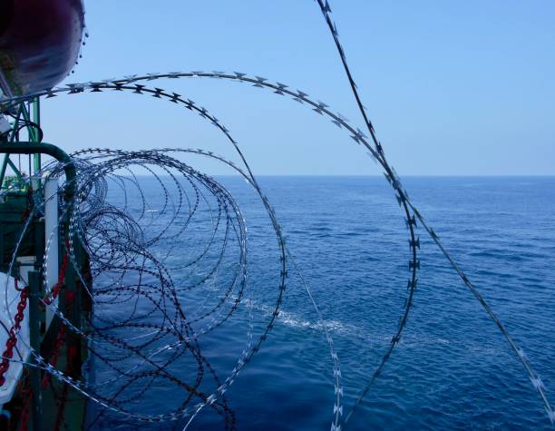 istock Vessel hardening is done with razor wire and wire fencing 1338180853