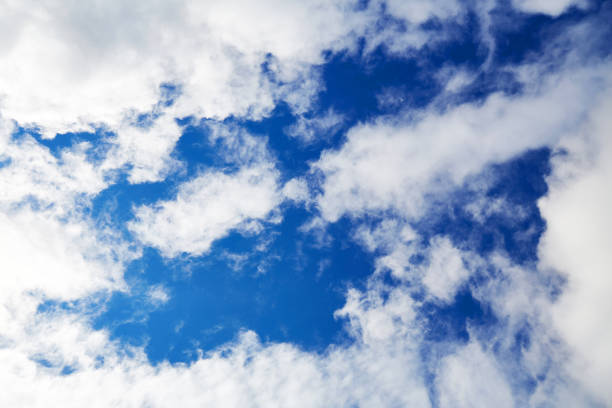 istock Cumulus clouds in a blue sky. Beautiful natural background 1338180950